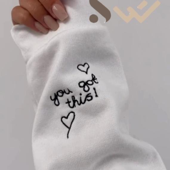 You Got This Embroidered on the sleeves